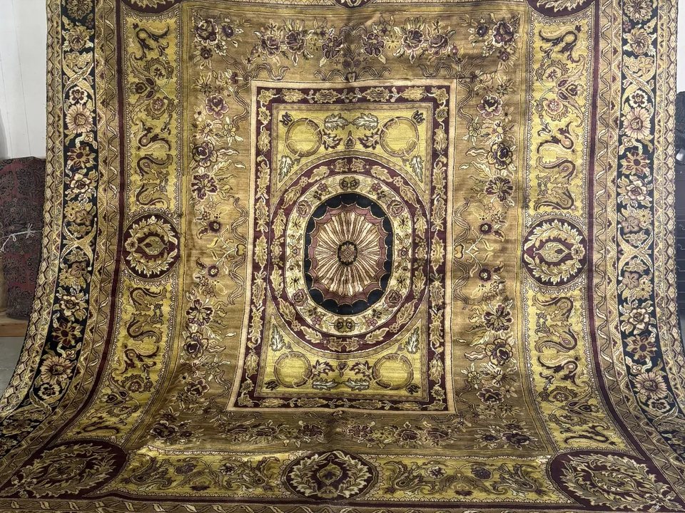Indian Savonnerie-style rug with a central rosette on a gold field