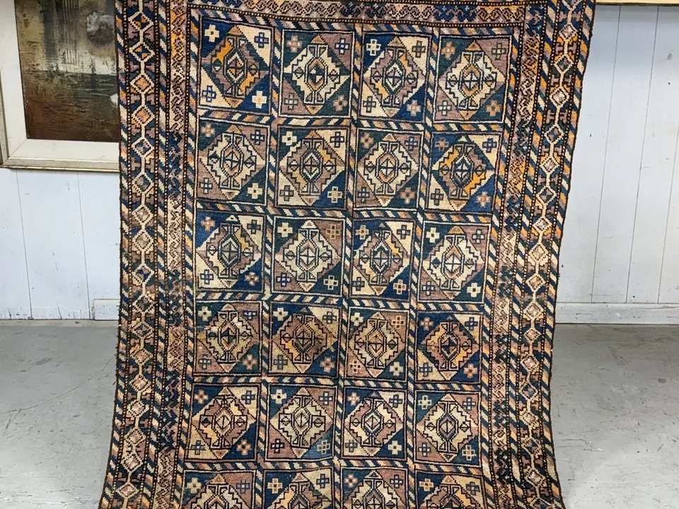 Hand-knotted Balouch rug with an all-over repeating design